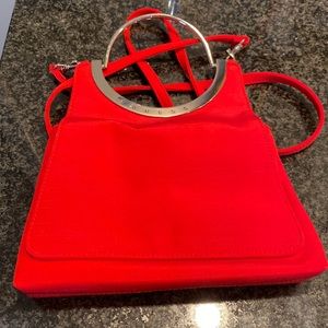 Guess crossbody or handle bag. Strap is detachable